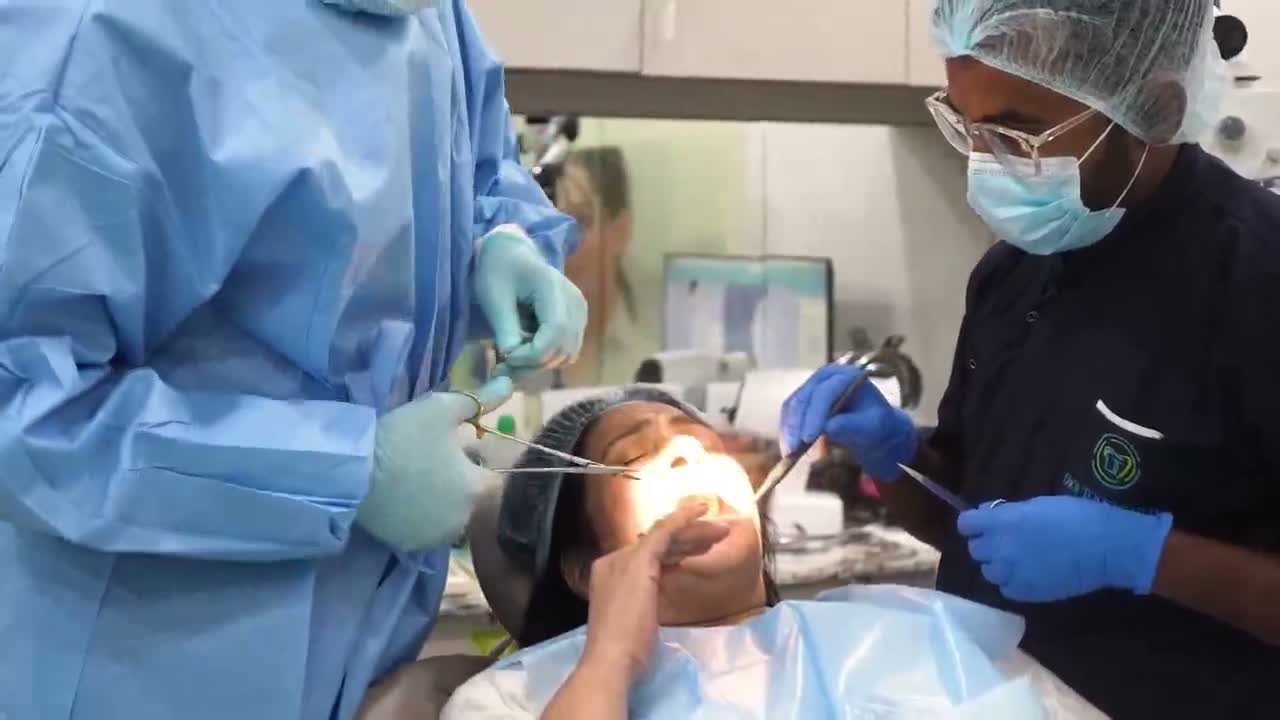 Our specialists providing microscope-assisted dental care